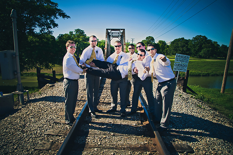 Close-up of bride and groom exchanging vows during an outdoor wedding ceremony